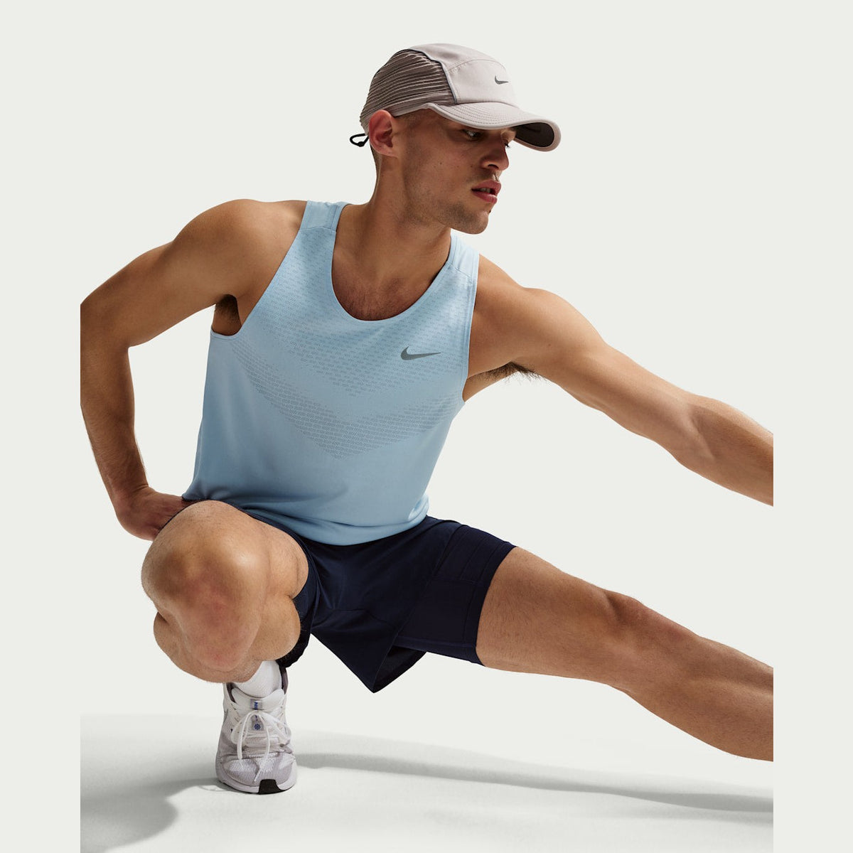 NIKE Stride Men's Dri-FIT ADV Running Tank Top - APPAREL - Mens Tanks