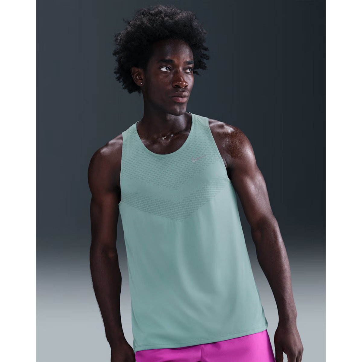 NIKE Stride Mens Dri-FIT ADV Running Tank Top APPAREL - Mens Tanks CANNON/REFLECTIVE SILVER