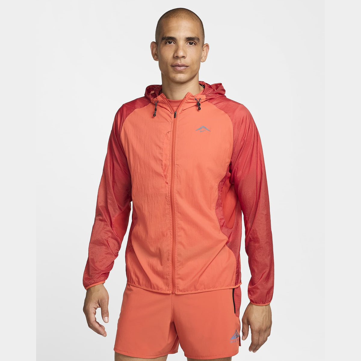 NIKE Trail Aireez Jacket Mens APPAREL - Mens Jackets VINTAGE CORAL/DRAGON RED/BLACK